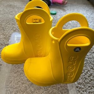 Toddler yellow Crocs rain boots